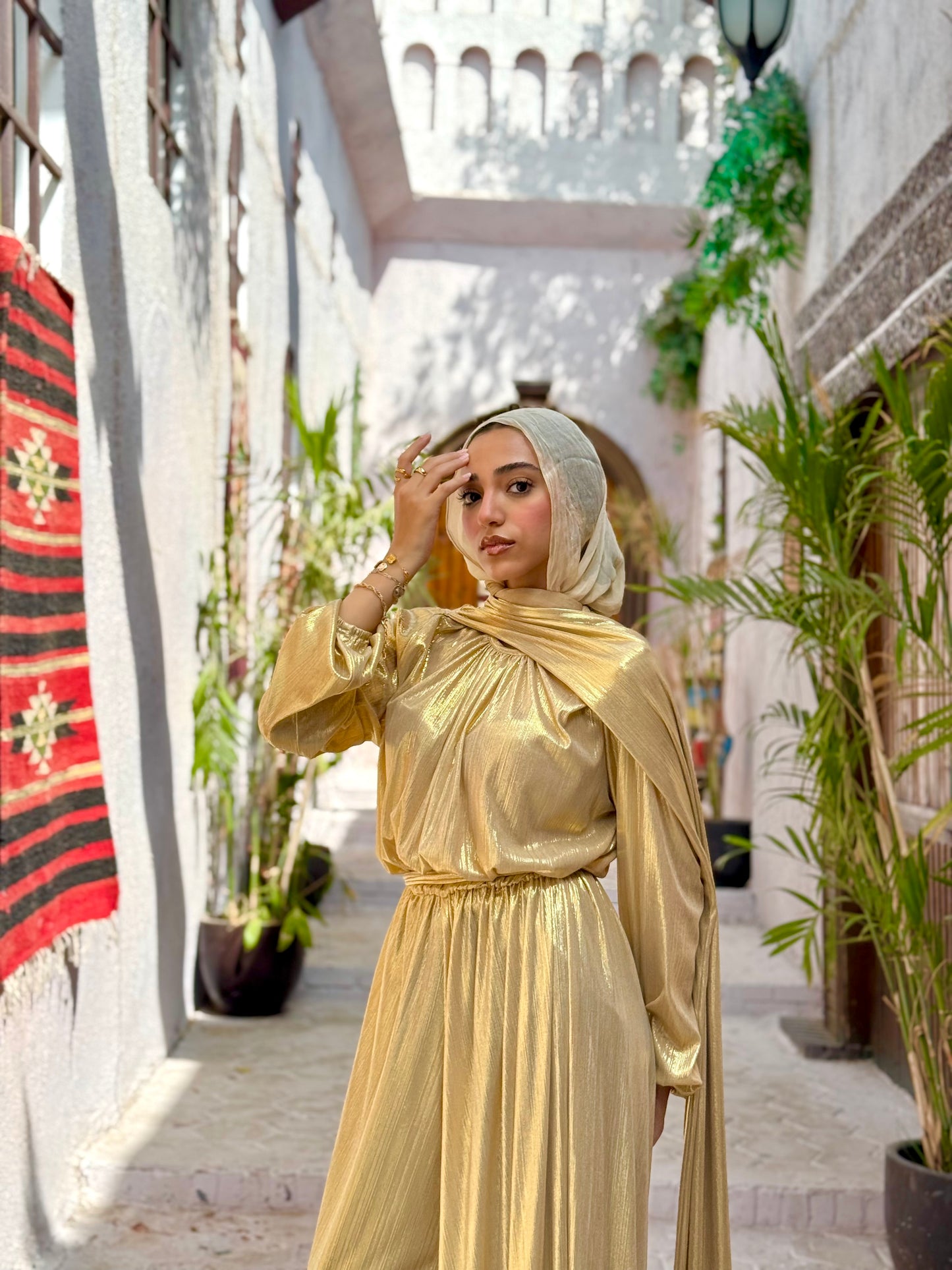 Radiance metallic jumpsuit in gold